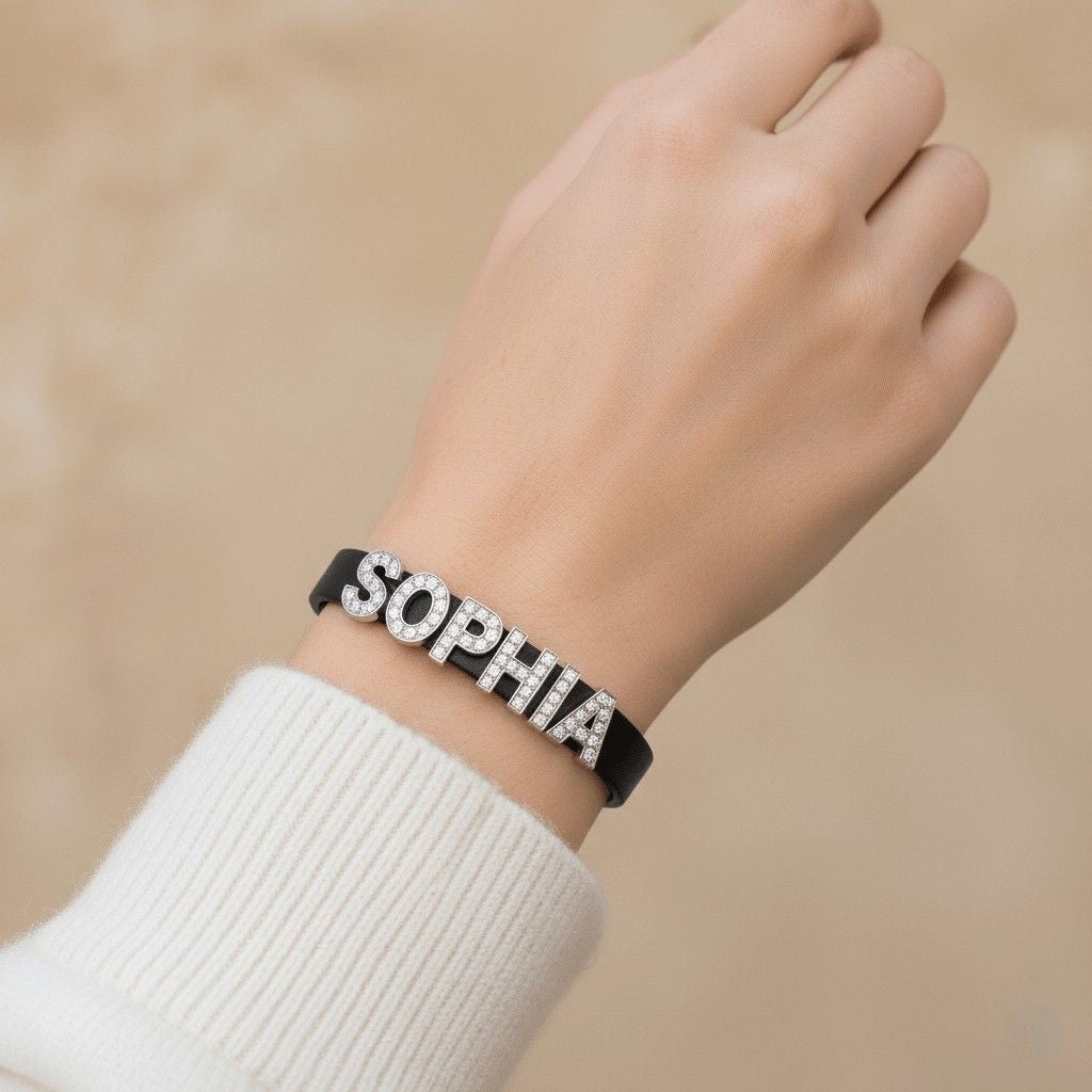 Rhinestone name bracelet with SOPHIA in crystal letters on black leather band