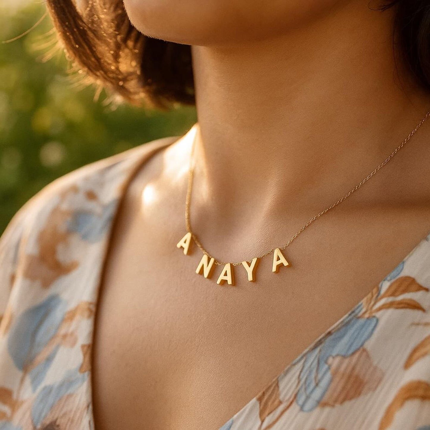 Gold personalized name necklace with ANAYA letters on delicate chain (1)