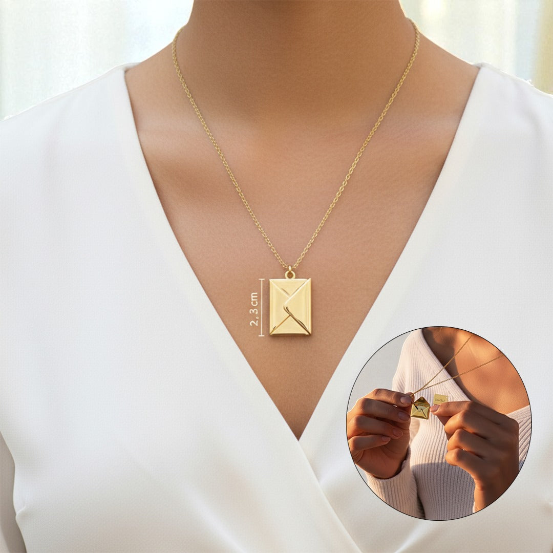 woman wearing a gold envelope locket necklace